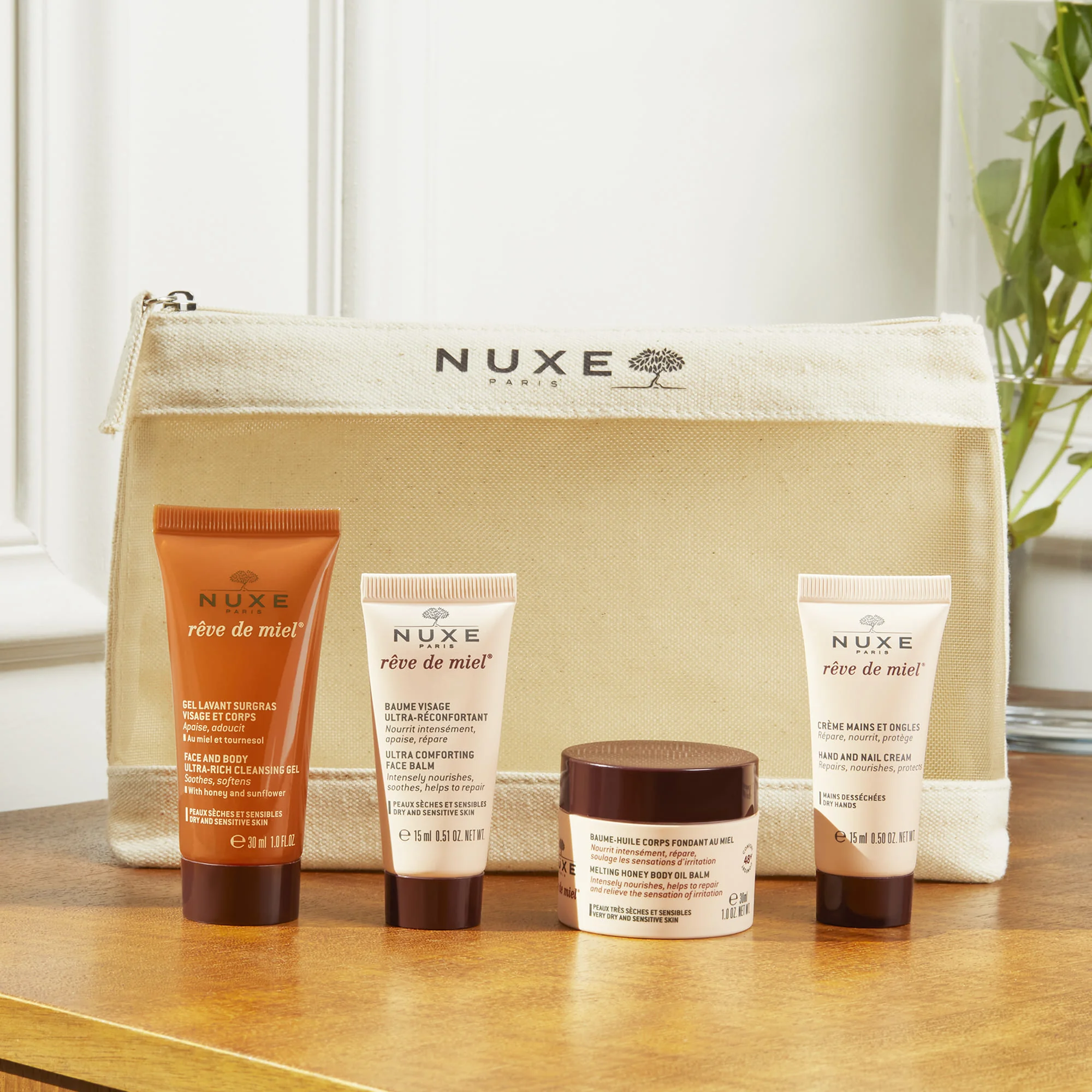 Nuxe Trousse Voyage Reve De Miel Gel Doccia 30ml + Balsamo Viso 15ml + Olio Corpo 30ml + Crema Mani e Unghie 15ml